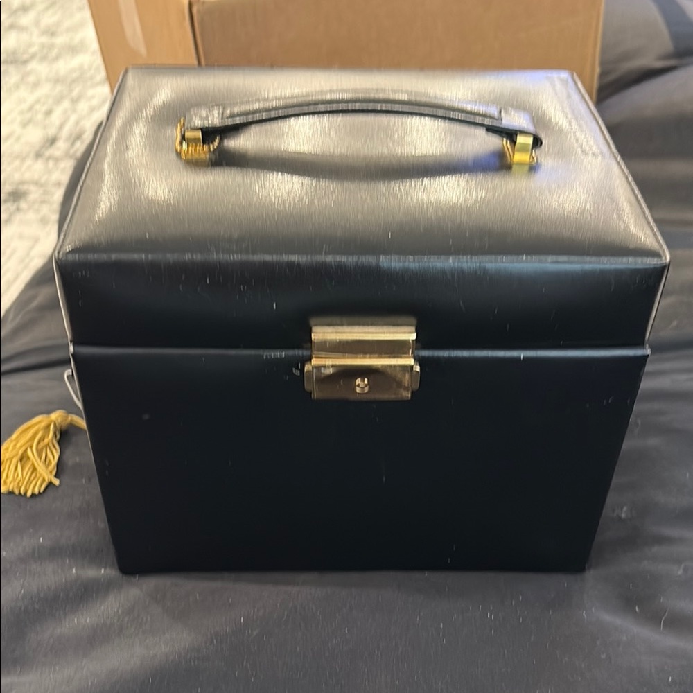 Chic Black Jewelry Box with Gold Tassel